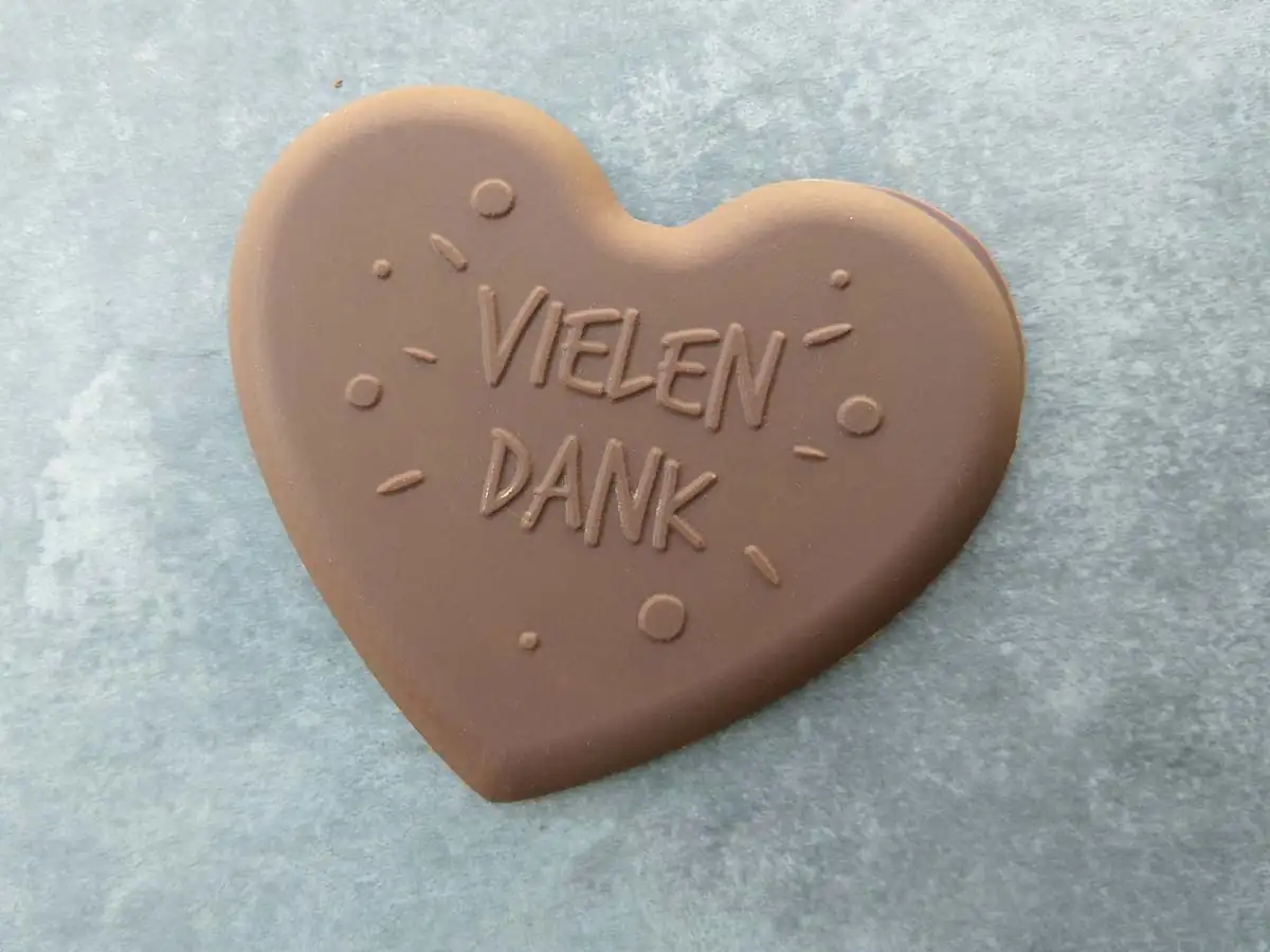 Heart-shaped chocolate with "Vielen Dank" message